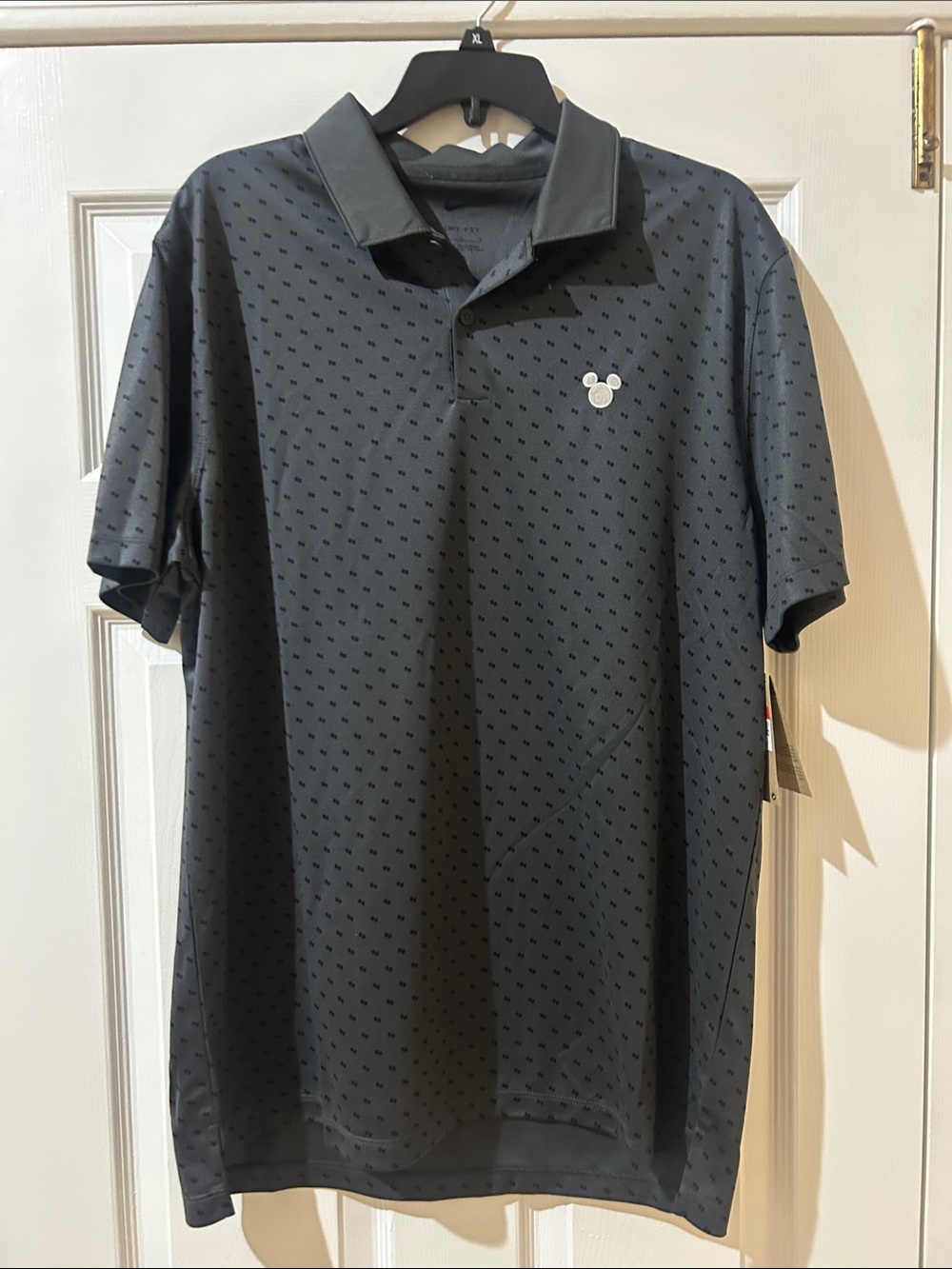 Nike Men's Black Polo Shirt with Subtle Micro Pattern